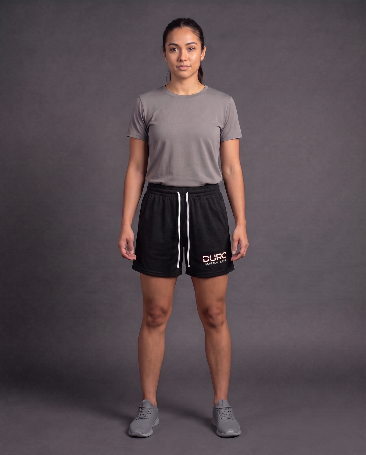 DURO Martial Arts Mesh Shorts modeled against a charcoal studio background — AI-generated styling image