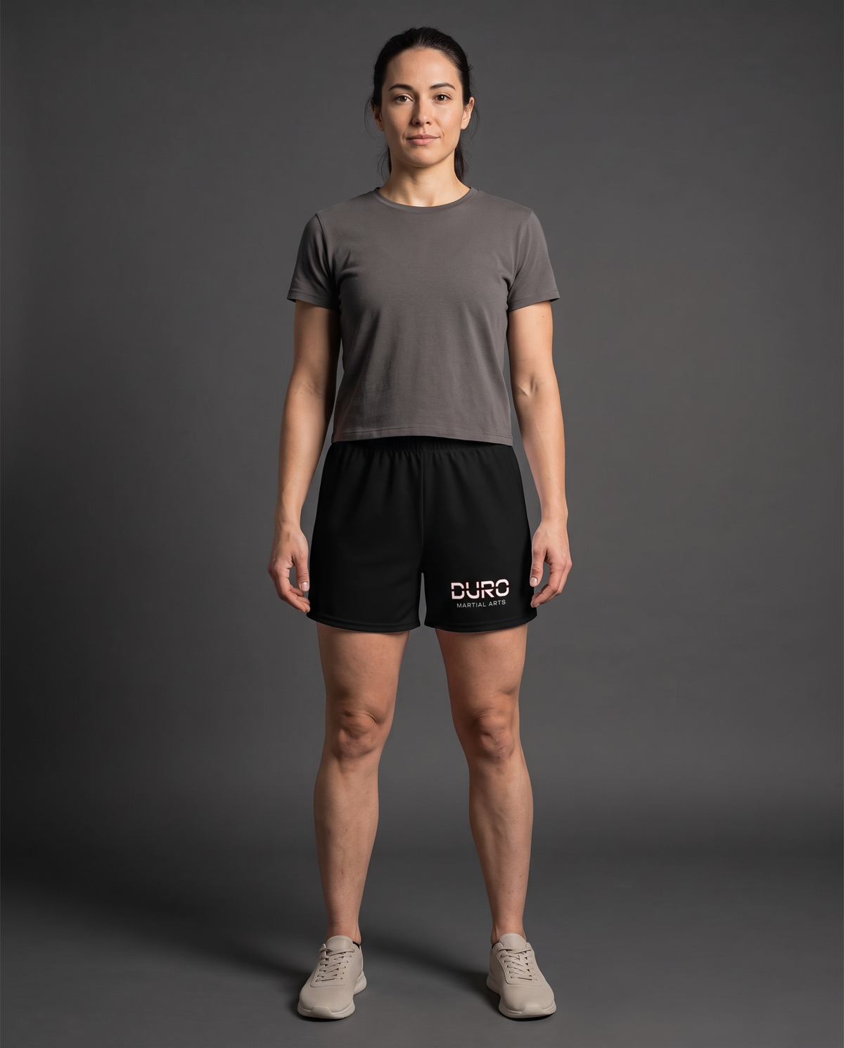 DURO Martial Arts Training Shorts modeled against a charcoal studio background — AI-generated styling image