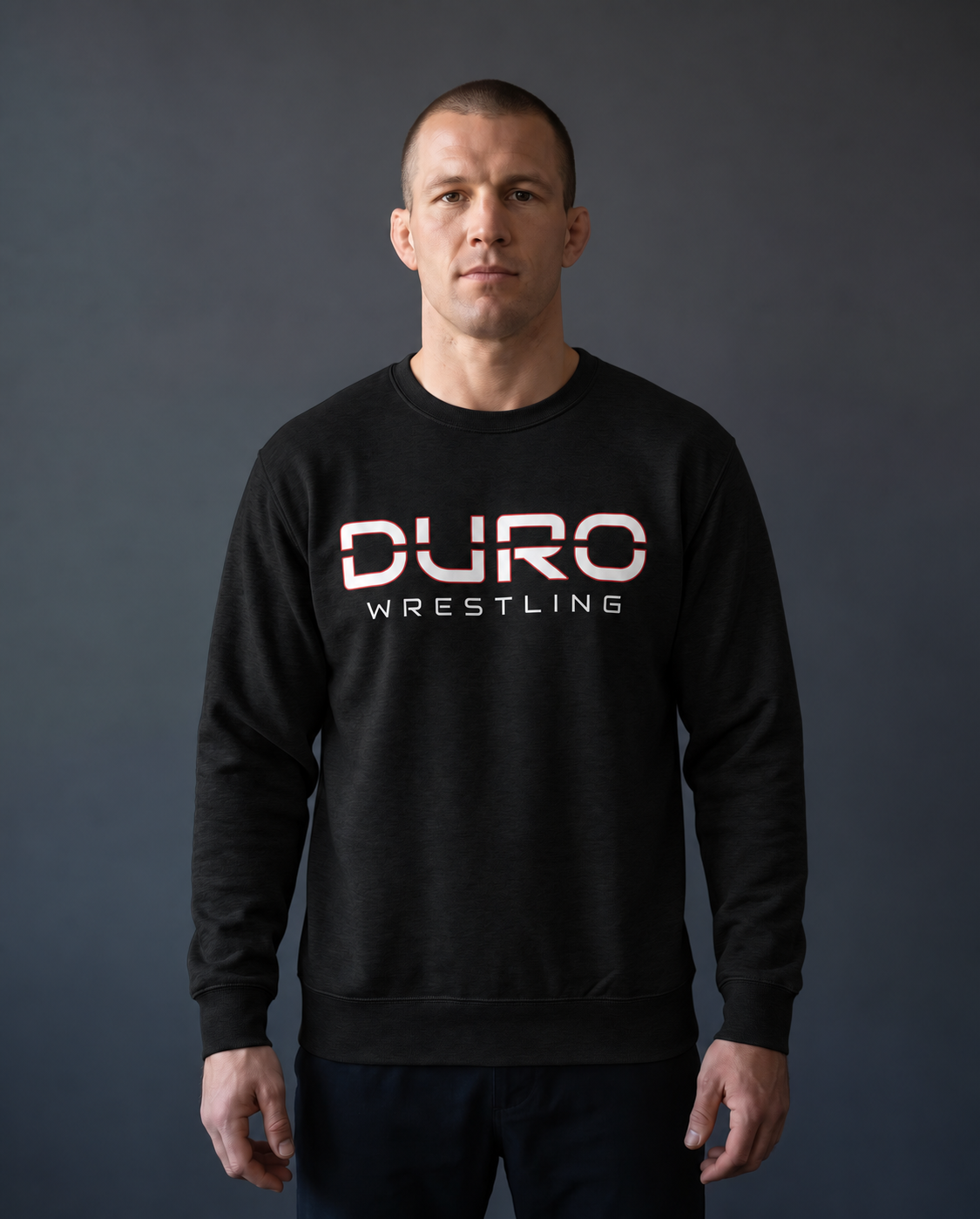Black DURO Wrestling Premium Training Crewneck modeled against a charcoal studio background — AI-generated styling image